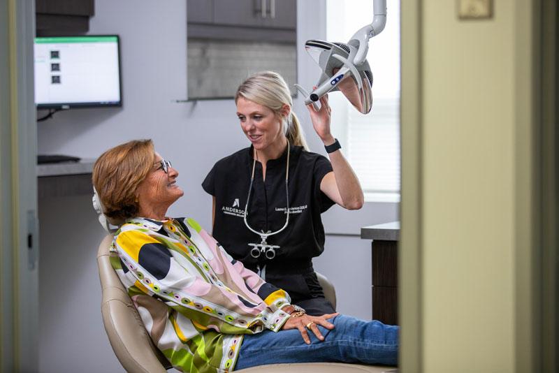 dr. lauren anderson with a crown lengthening dental patient.