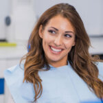 a laser gum disease patient smiling after a procedure.