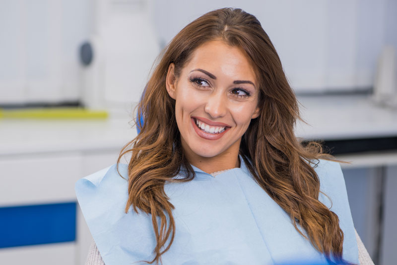 a laser gum disease patient smiling after a procedure.